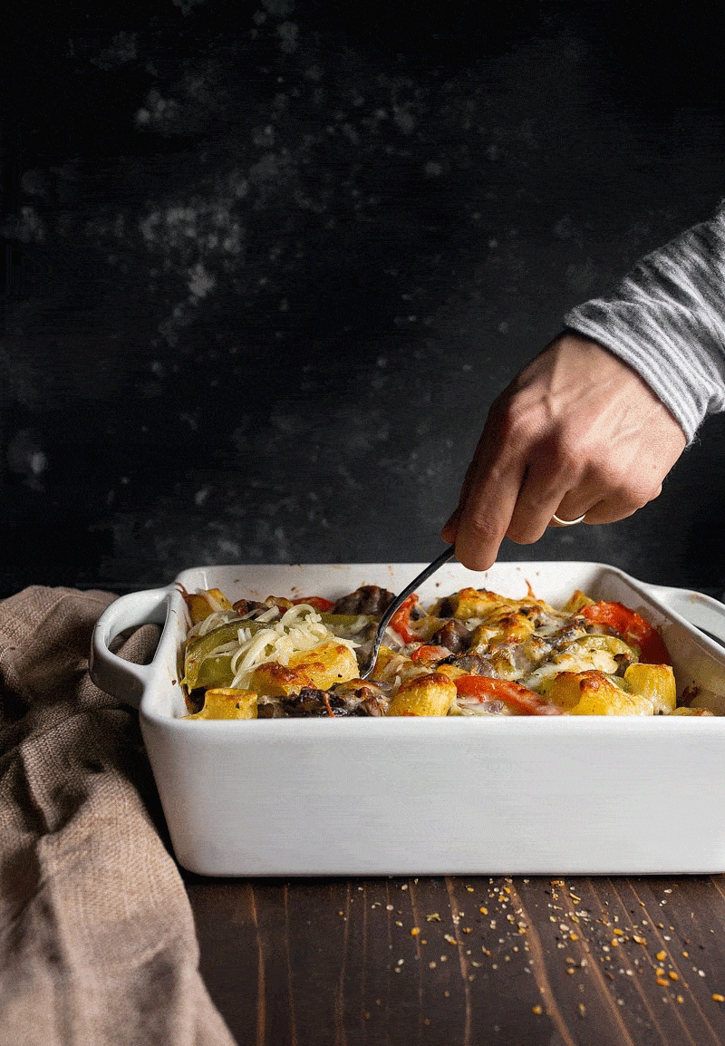 Philly Cheesesteak Pasta. Creamy baked pasta with peppers, onions, and steak.