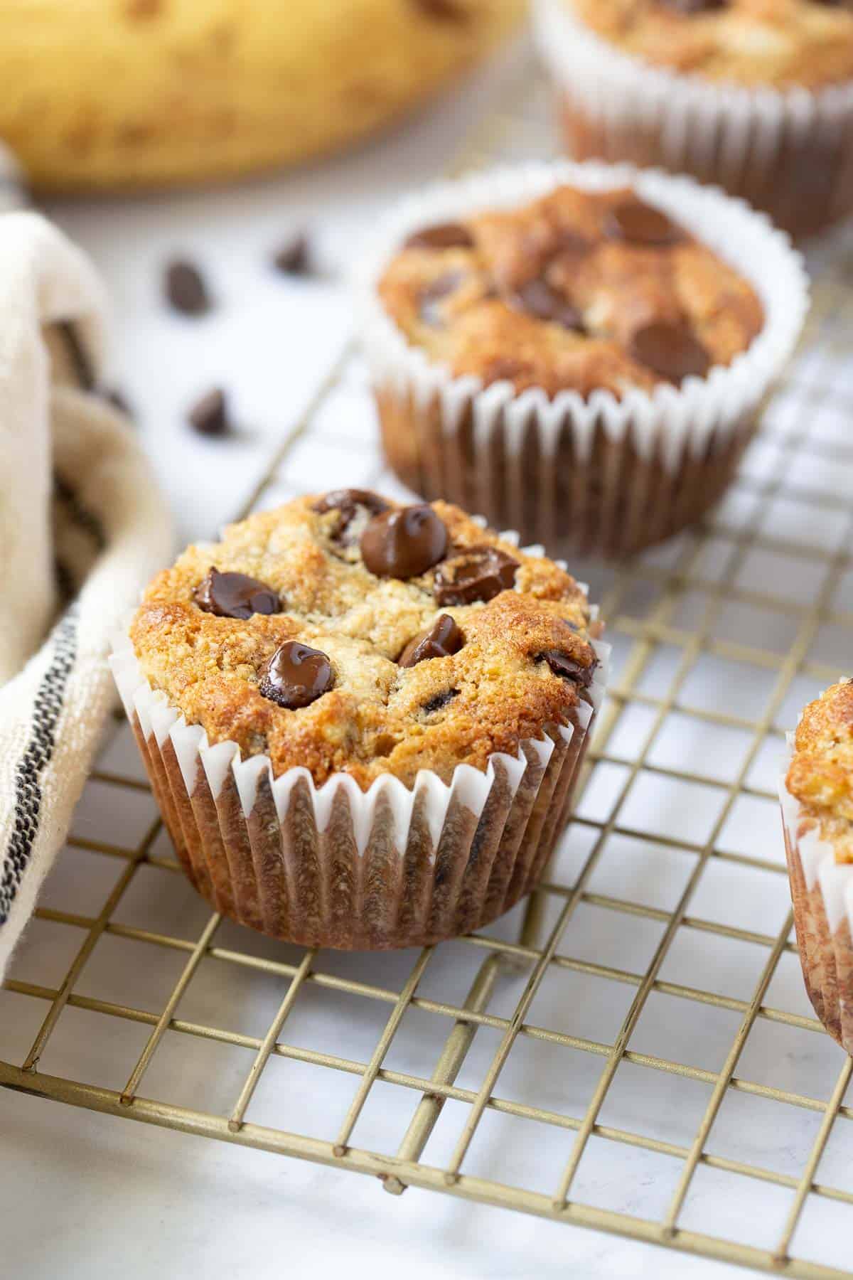 Close up of banana muffin with chocolate chips on top.