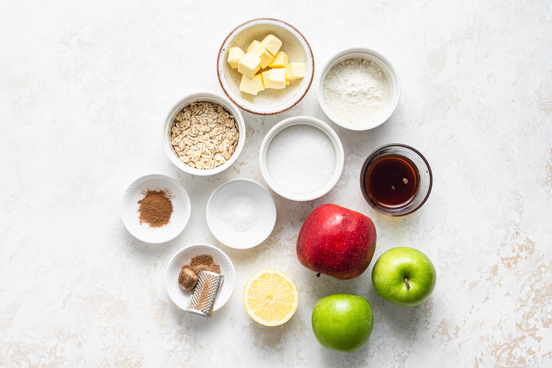 Ingredients for apple crisp on table.