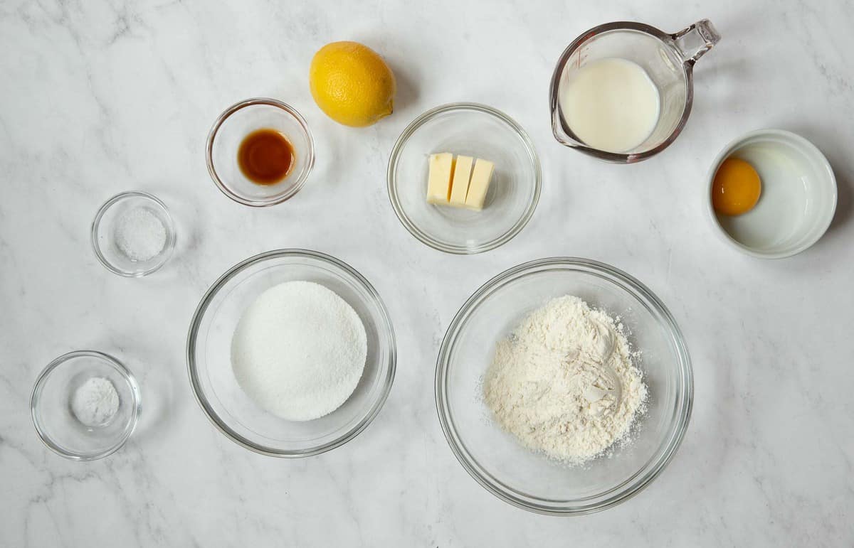 Lots of bowls of ingredients for cookies.
