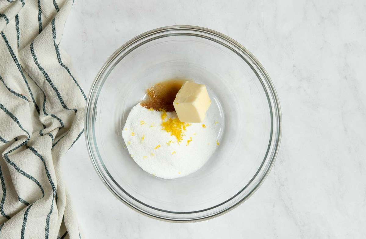 Bowl with butter, sugar, lemon zest and vanilla.