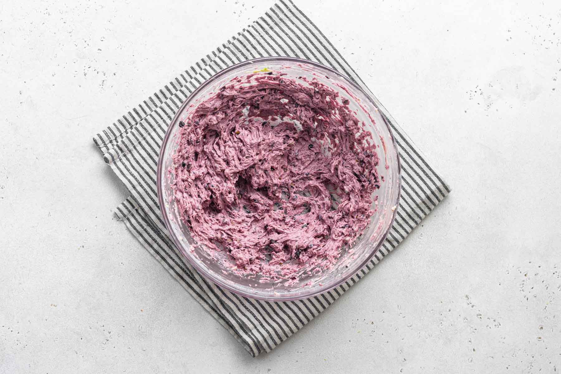 Purple fresh blackberry buttercream frosting.