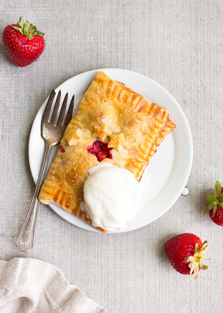 Blueberry Hand Pies Recipe: a mini blueberry pie you can hold in your hand. The best hand pie recipe.