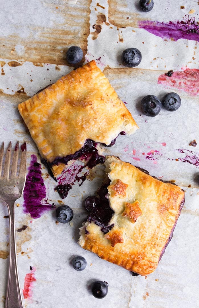 Blueberry Hand Pies Recipe: a mini blueberry pie you can hold in your hand. The best hand pie recipe.