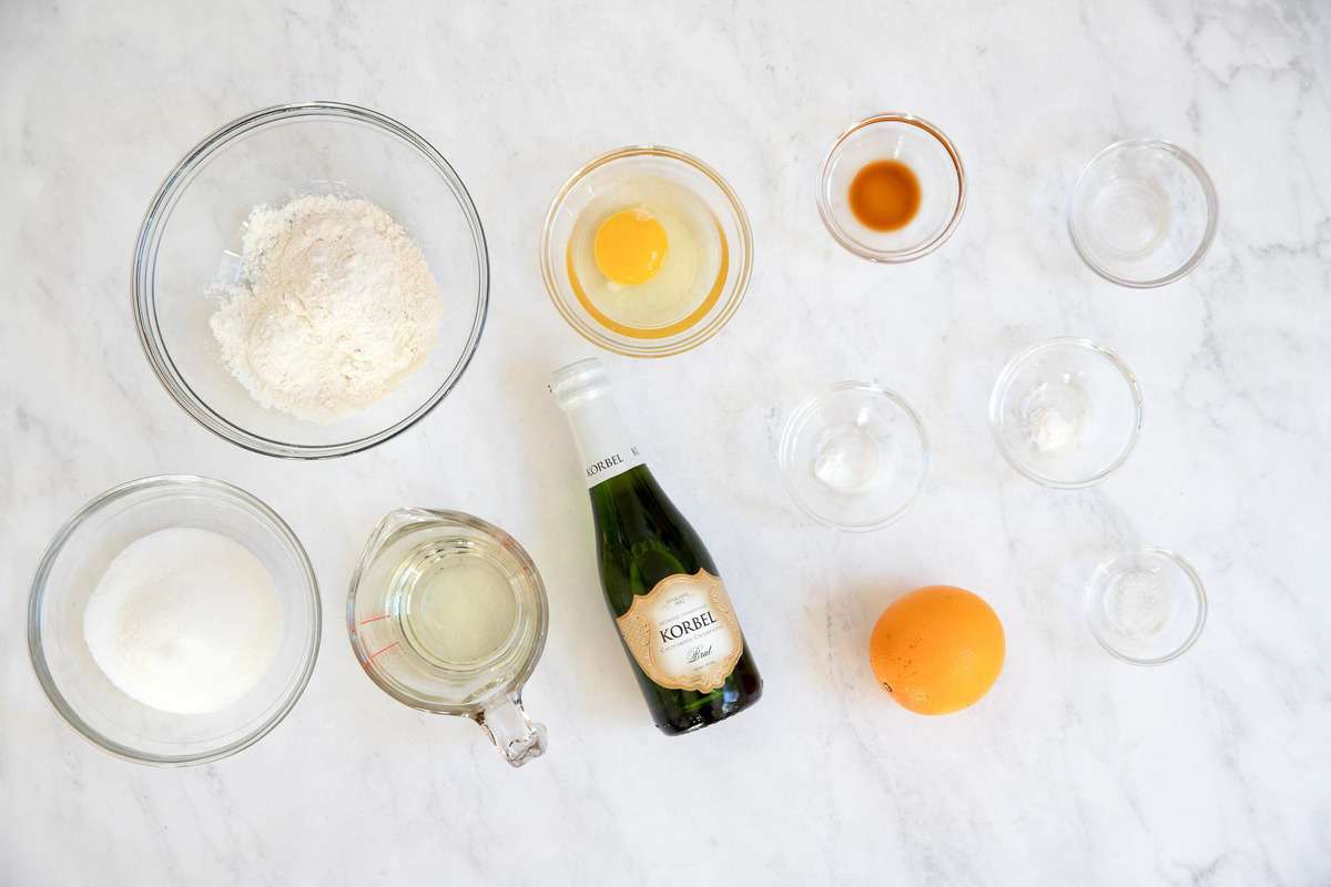 Ingredients for champagne cupcakes in little bowls.