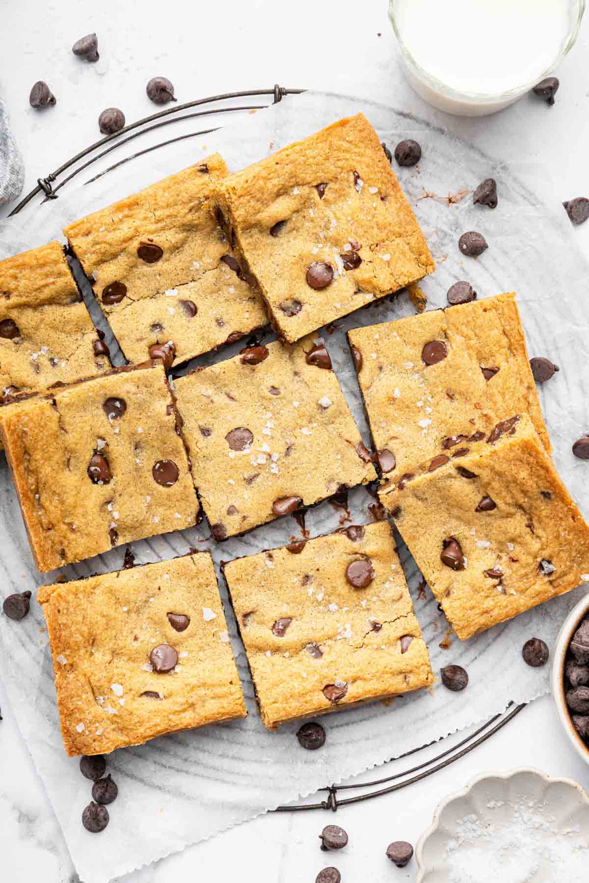 Overhead image of 9 cookie bars on a wire rack.