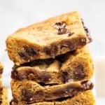 Stack of chocolate chip cookie bars up close, macro shot.