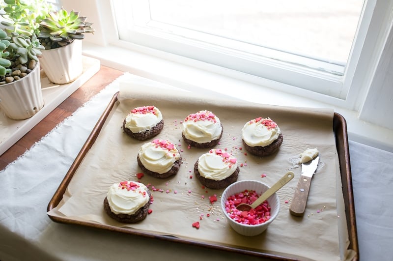 Frosted Chocolate Cookie with Valentine's Day sprinkles. Small batch cookies for two for Valentine's Day