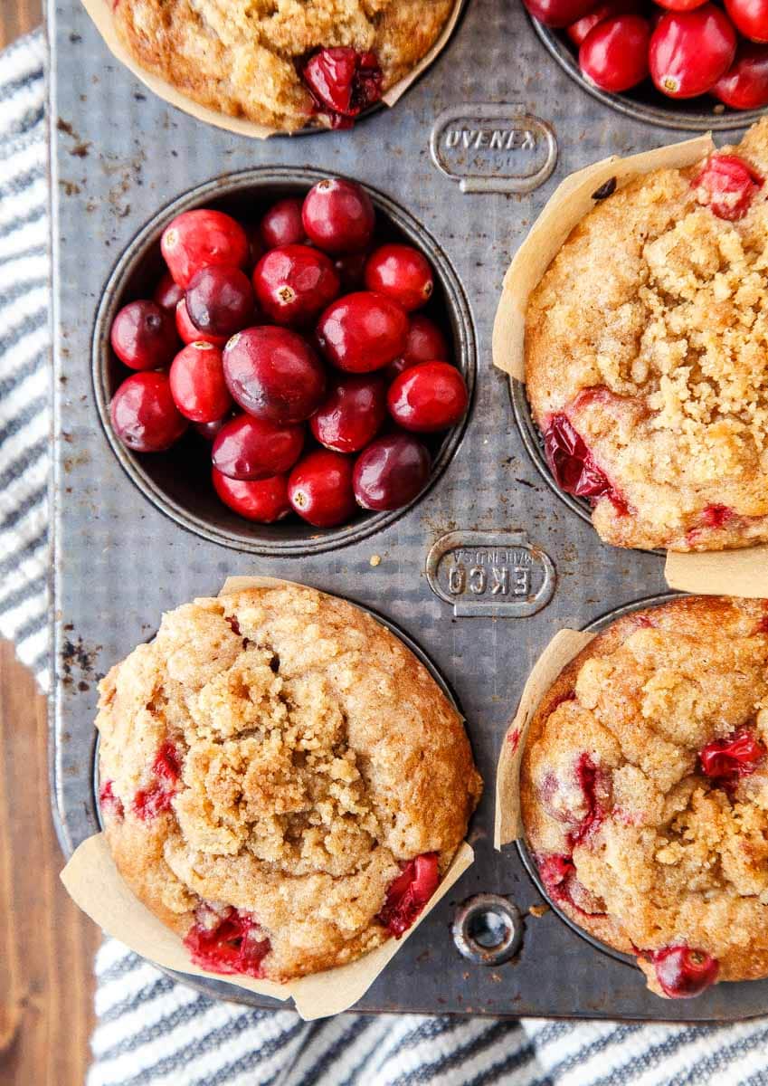 Sour Cream Coffee Cake Muffins made with fresh cranberries. Sour cream coffee cake muffins with streusel and cranberries