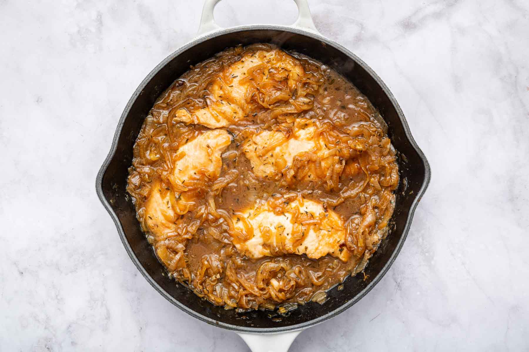 French onion chicken recipe in skillet.