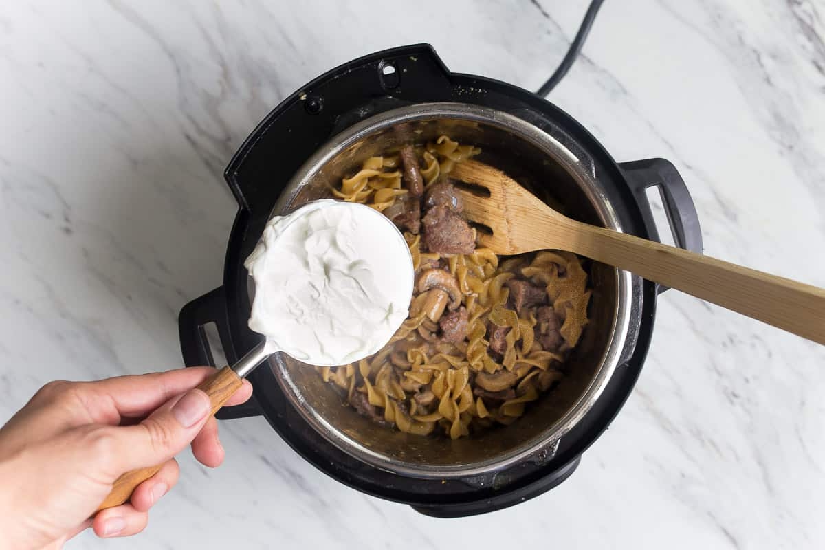 sour cream into pot of beef and noodles.