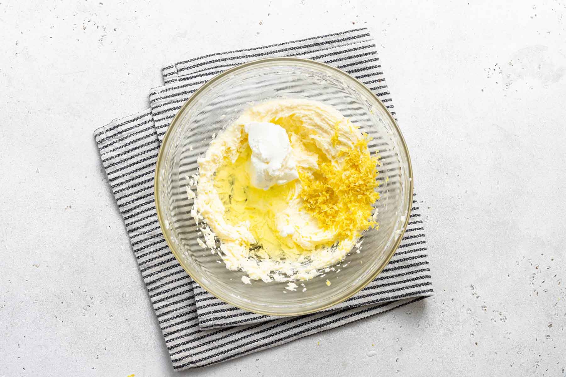 Lemon cupcake batter in bowl.