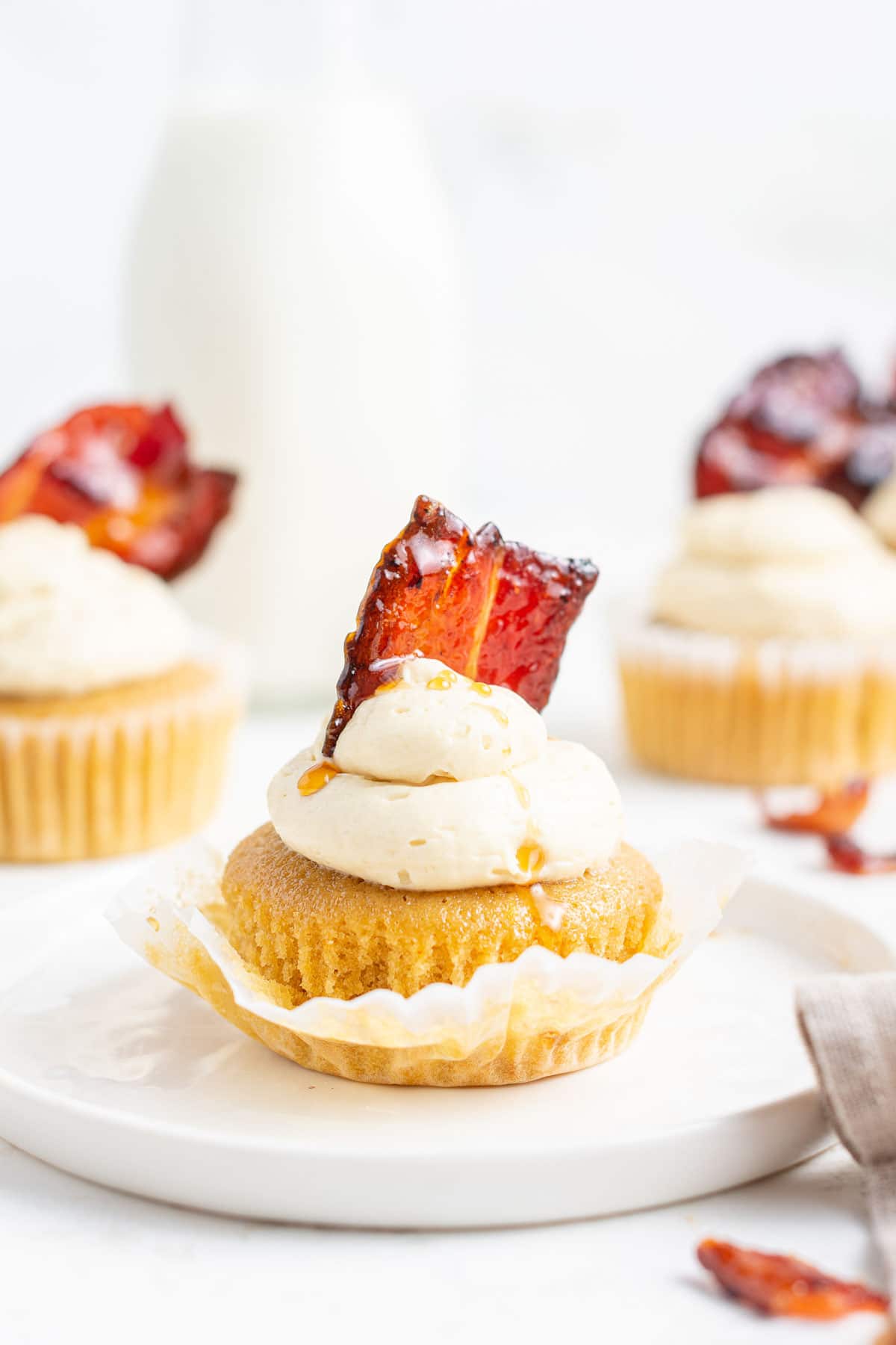 Bacon on top of maple cupcakes.