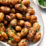 Hero image of roasted ranch potatoes on oval platter.