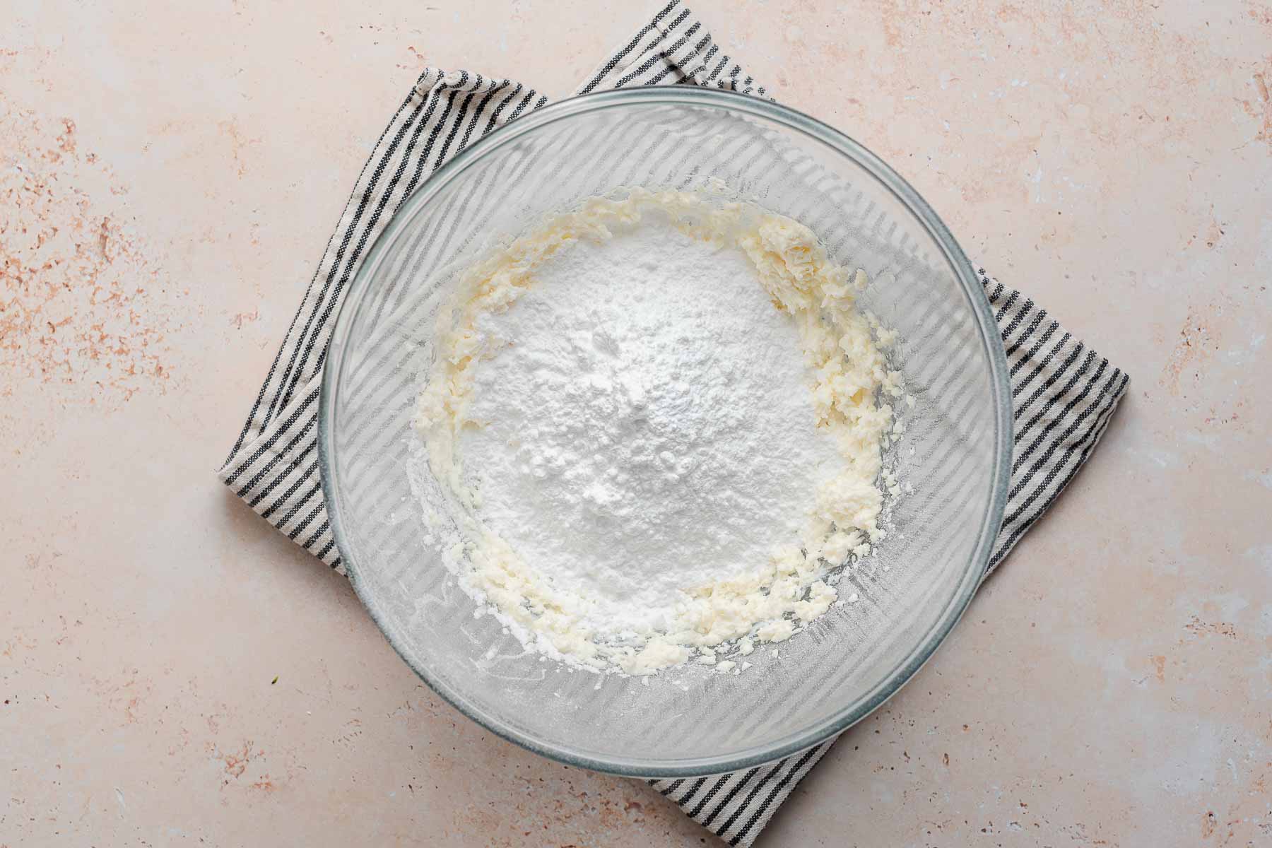 Powdered sugar in frosting bowl.